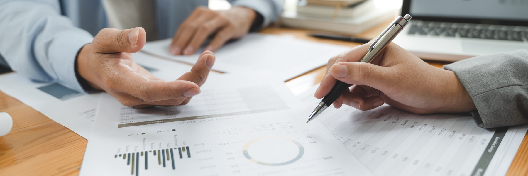Startup business people teamwork calculating a valuation in work